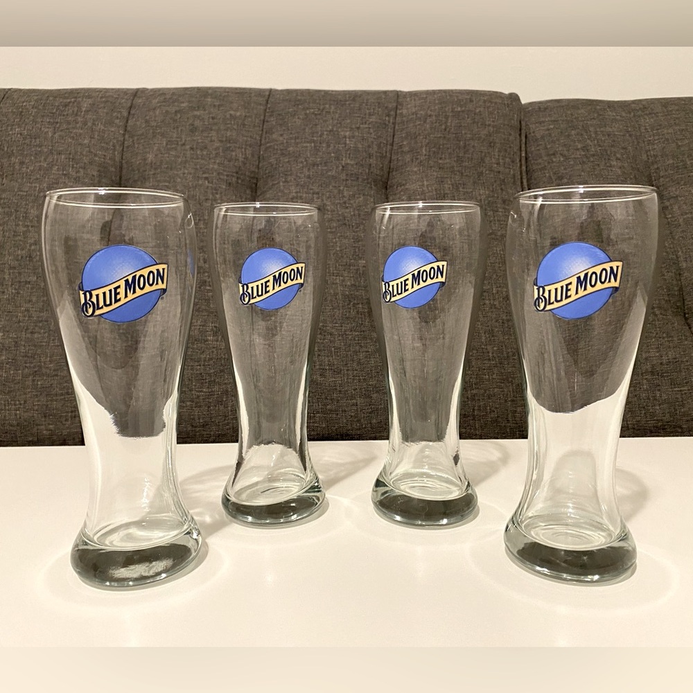 Set of 4 blue moon pint glasses with logo.
